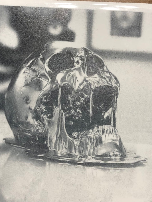 'Liquid Metal Skull' on a Four Inch White Ceramic Tile