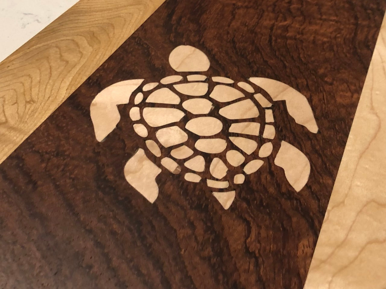 Sea Turtle Babinga Cutting Board with Maple Inlay